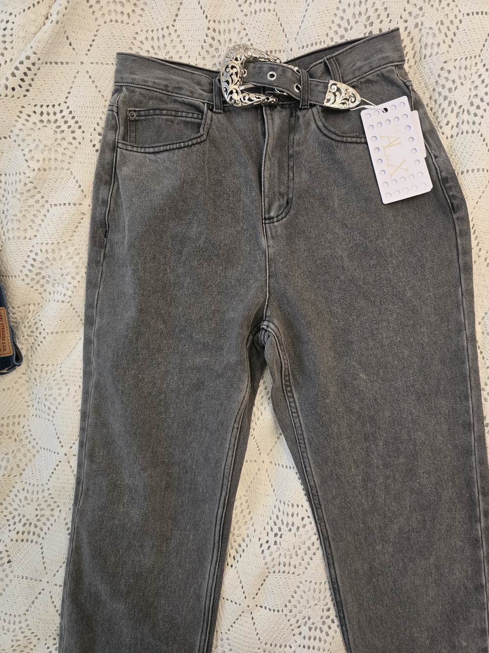 High-Waist Gray Mom Jeans with Decorative Silver Buckle Belt